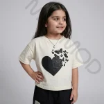 ست کراپ شلوارک دخترانه مدل قلب پروانه ای کرم مشکی سایز 5,50,55,60 - تصویر 5